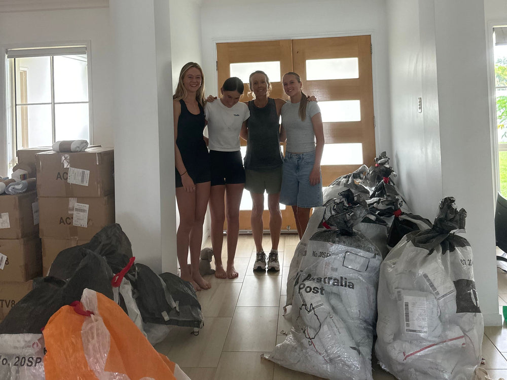 Vick and helpers at home with bags of packed orders ready for Australia Post