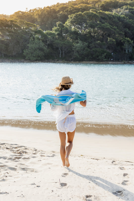 Highly absorbent, quick dry, Sand repellent, Lightweight, Australian owned & designed, Made from 8 recycled bottles, Car Hooded, zipped accessory pocket, premium beach towel, gym towel.