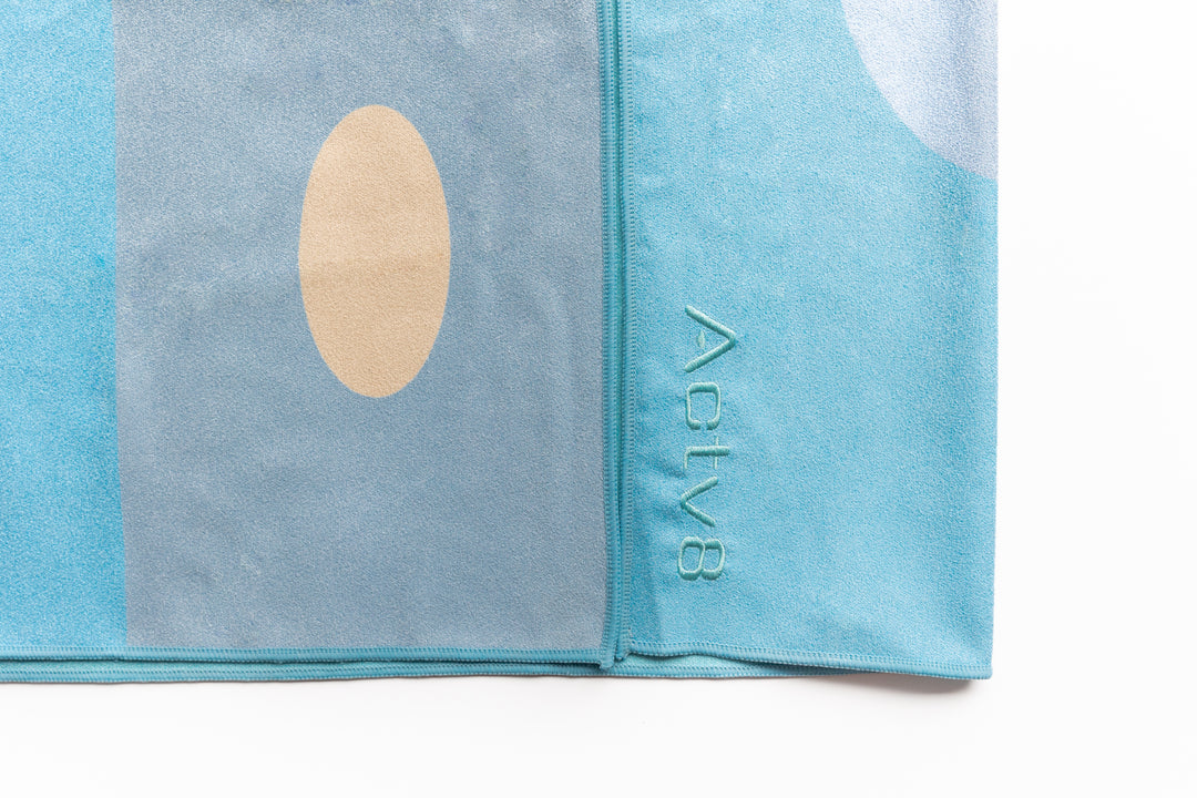 Highly absorbent, quick dry, Sand repellent, Lightweight, Australian owned & designed, Made from 8 recycled bottles, Car Hooded, zipped accessory pocket, premium beach towel, gym towel.