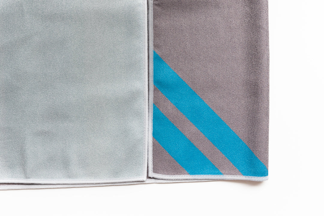 Highly absorbent, quick dry, Sand repellent, Lightweight, Australian owned & designed, Made from 8 recycled bottles, Car Hooded, zipped accessory pocket, premium beach towel, gym towel.
