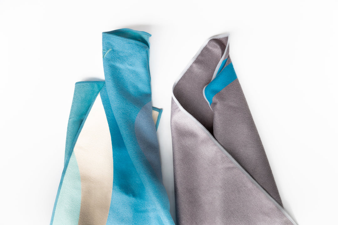 Highly absorbent, quick dry, Sand repellent, Lightweight, Australian owned & designed, Made from 8 recycled bottles, Car Hooded, zipped accessory pocket, premium beach towel, gym towel.