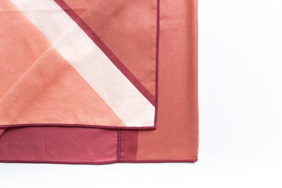 Highly absorbent, quick dry, Sand repellent, Lightweight, Australian owned & designed, Made from 8 recycled bottles, Car Hooded, zipped accessory pocket, premium beach towel, gym towel.